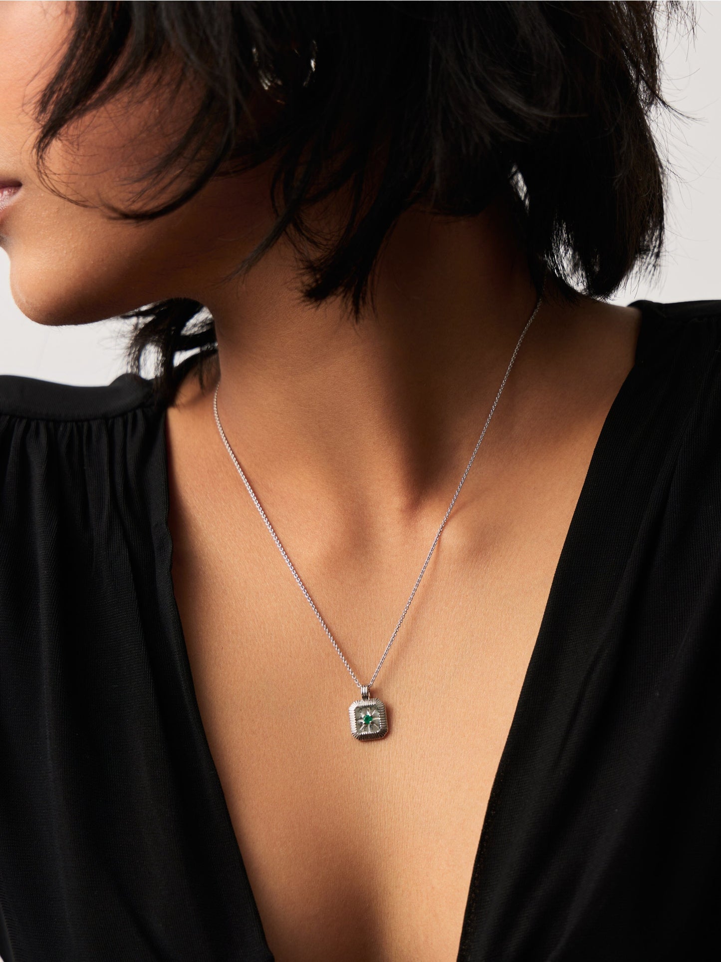 sterling silver birthstone necklace with square pendant and birthstone on a dainty chain