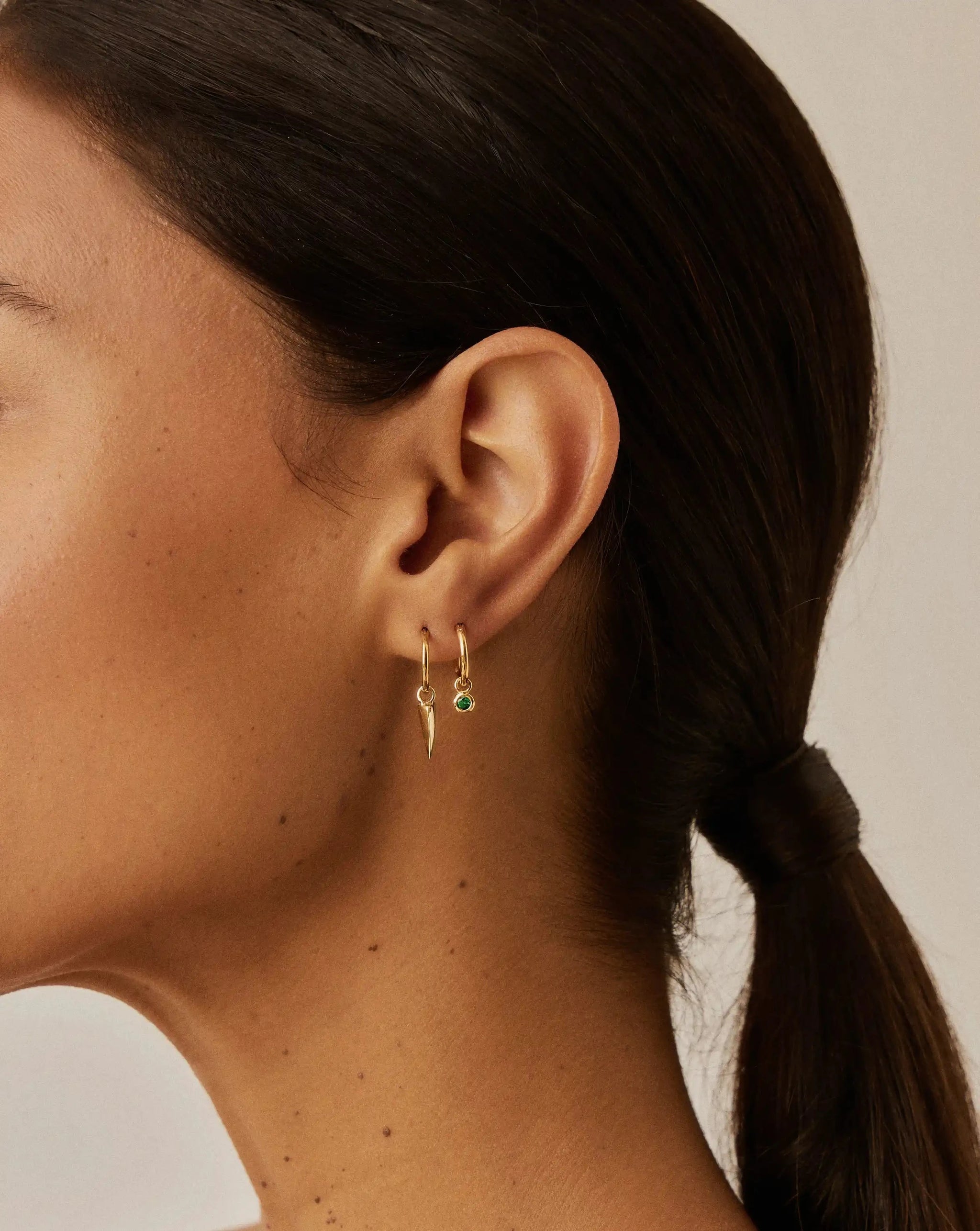 Tennis Charm Mini Hoop Earrings | 18k Gold Vermeil/Emerald Green Nano-crystal Earrings Missoma