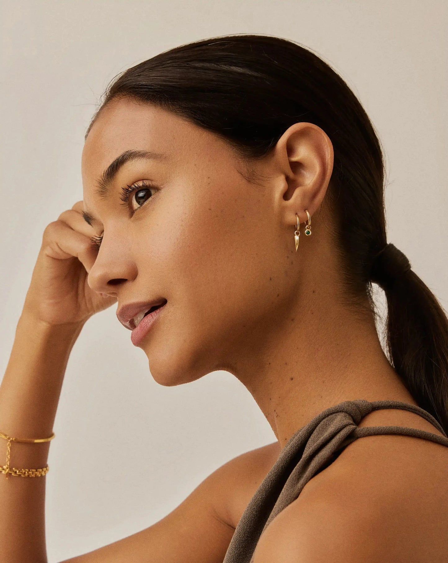 Tennis Charm Mini Hoop Earrings | 18k Gold Vermeil/Emerald Green Nano-crystal Earrings Missoma