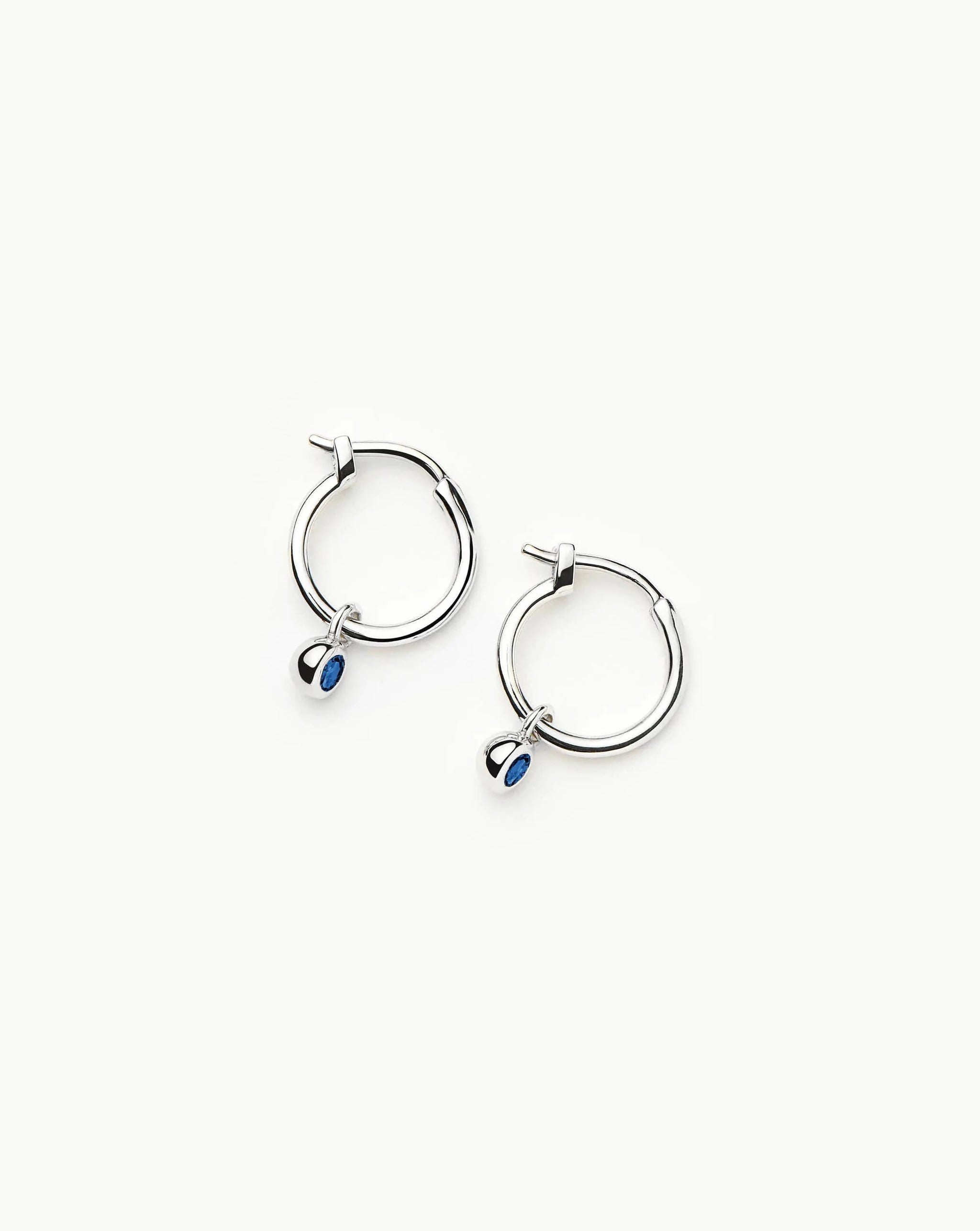 Tennis Charm Mini Hoop Earrings | Sterling Silver/Sapphire Blue Nano-crystal Earrings Missoma