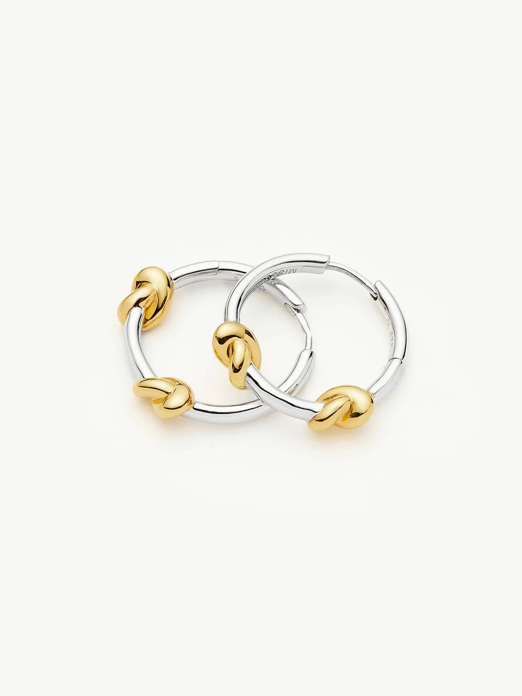 mix metal gold and silver hoop earrings