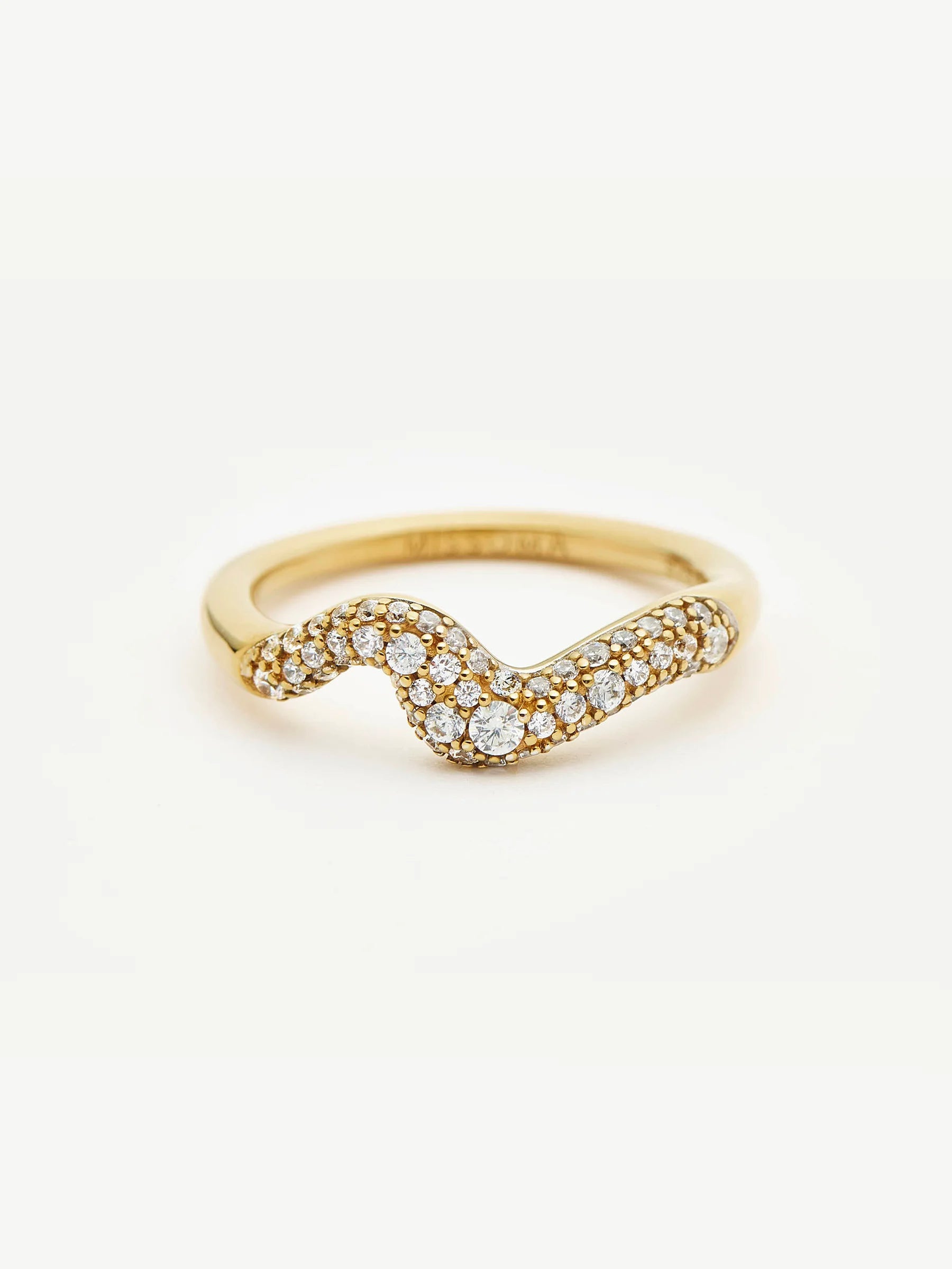 gold ring set ripple design with pave detail
