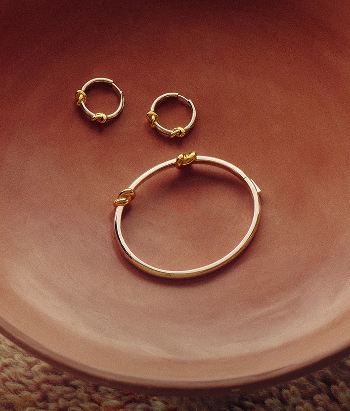 Mixed metal bangle and Earrings with knots
