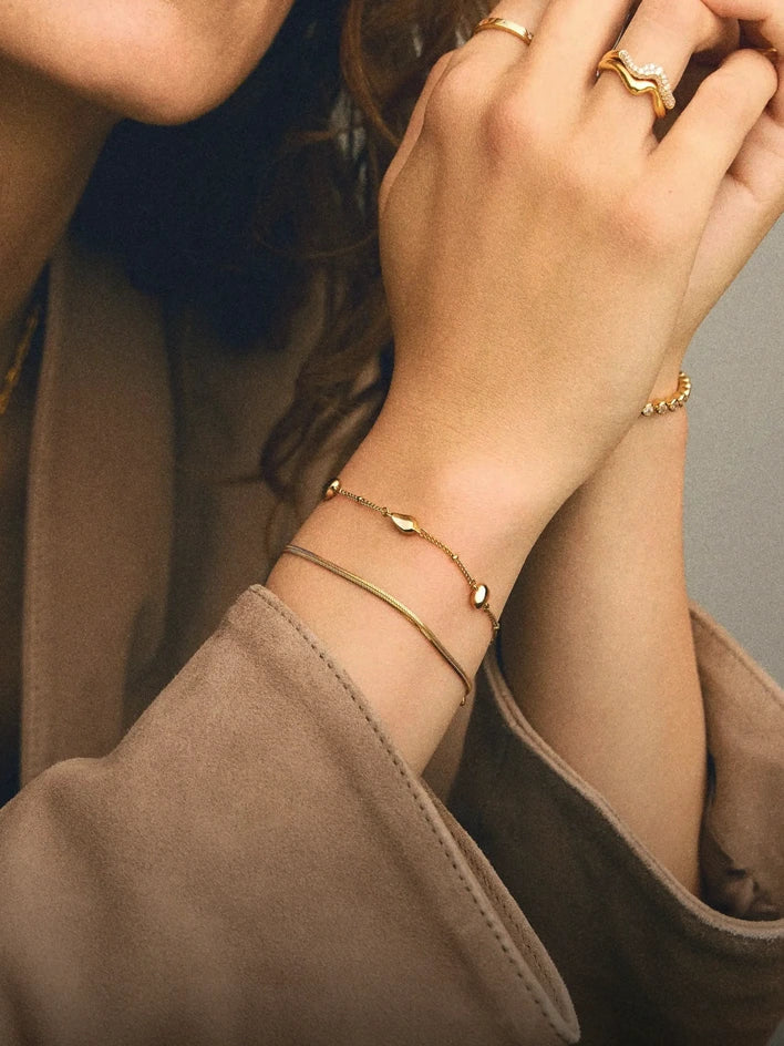 Molten teardrop multi charm bracelet