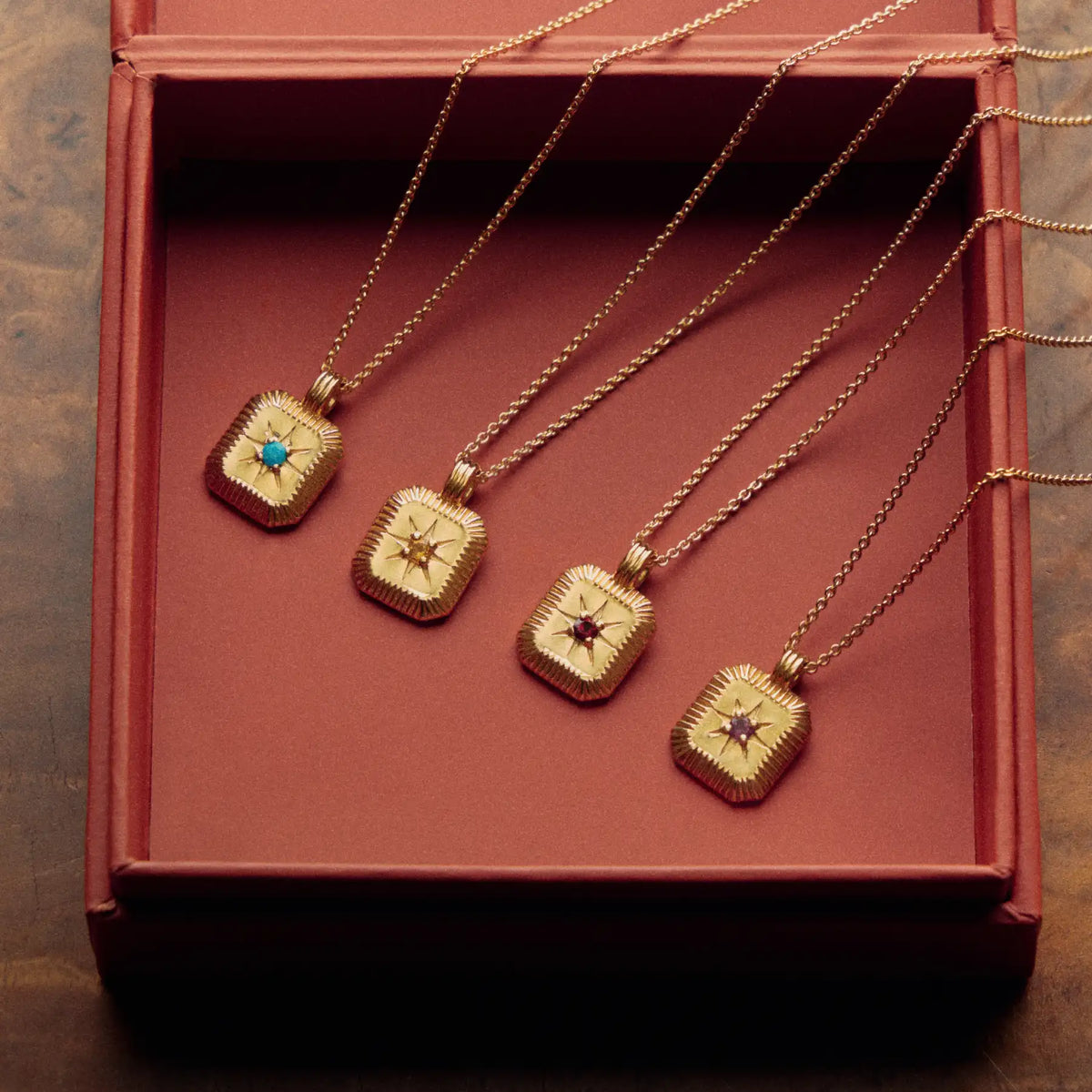 Gold Birthstone Necklaces in a red box