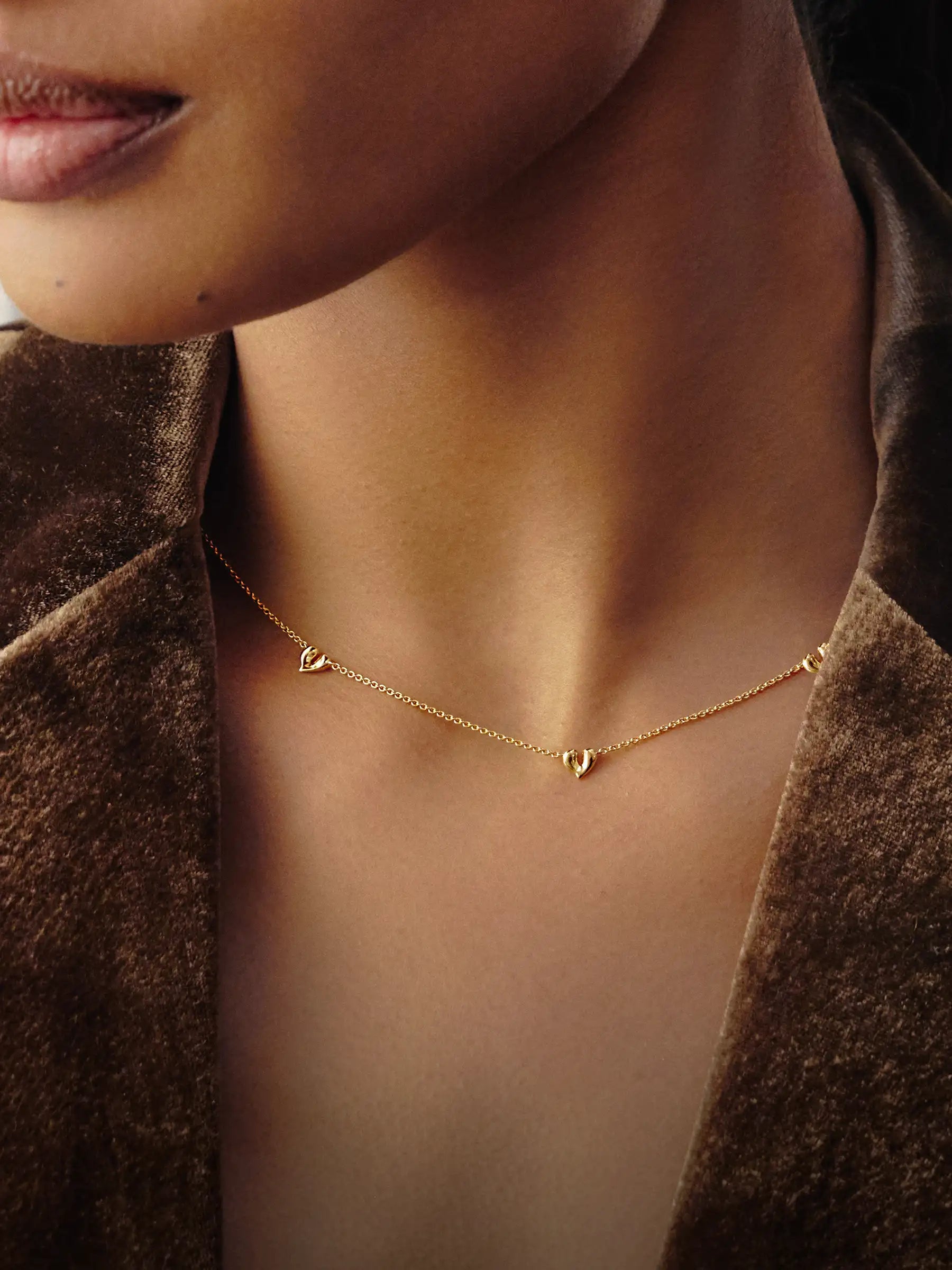 Molten Heart shaped chocker in gold