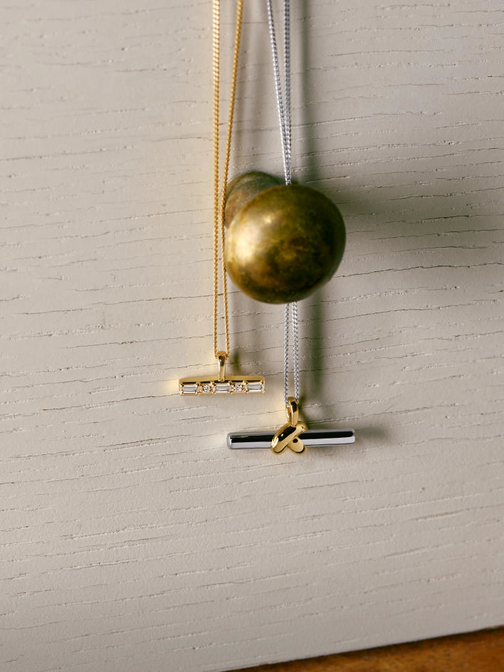 Gold mixed metal t-bar necklaces