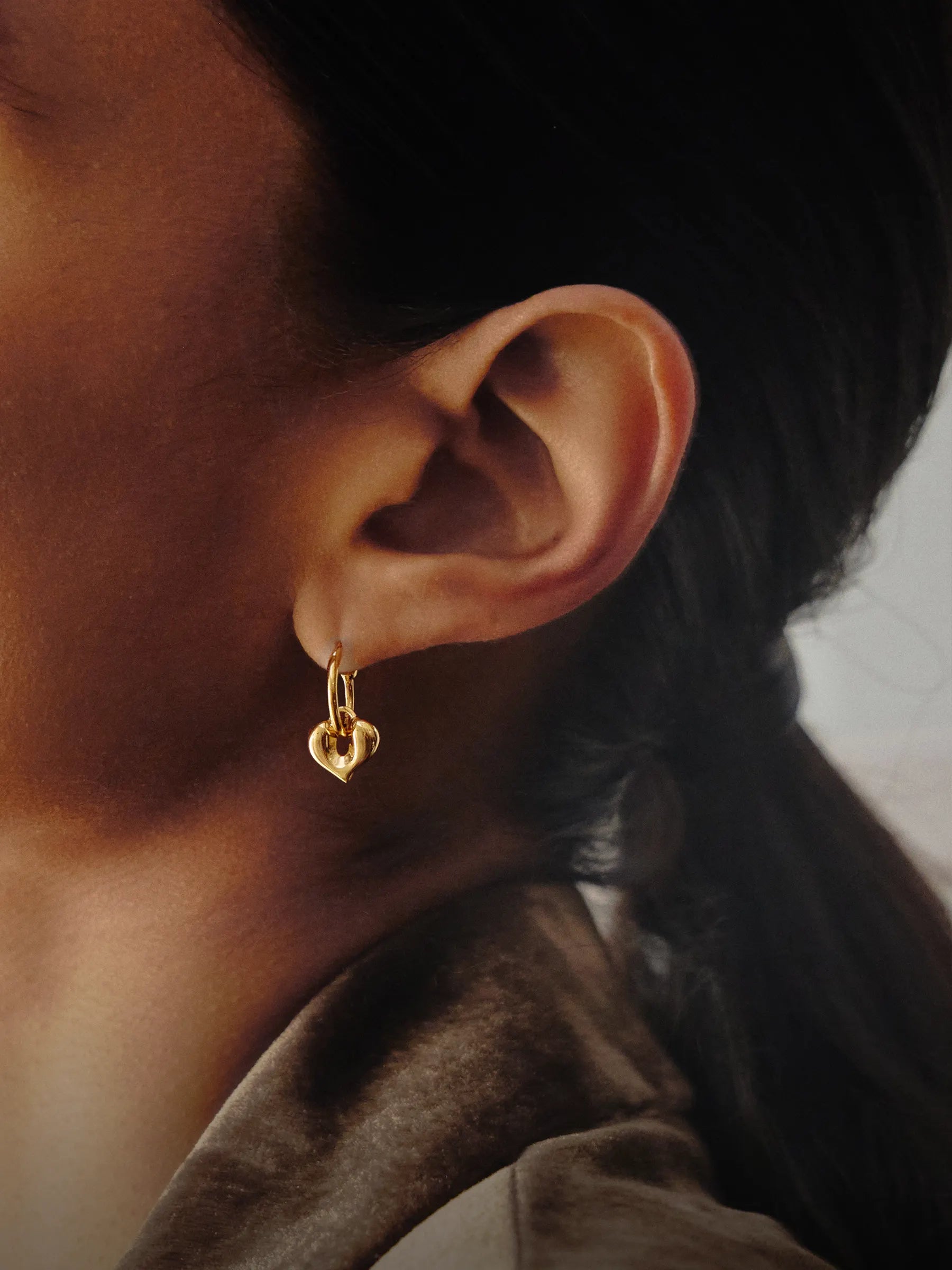 mini heart charm hoop earrings in gold