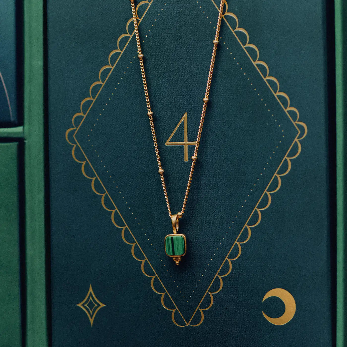 jewelry advent calendar gold with gold malachite square necklace