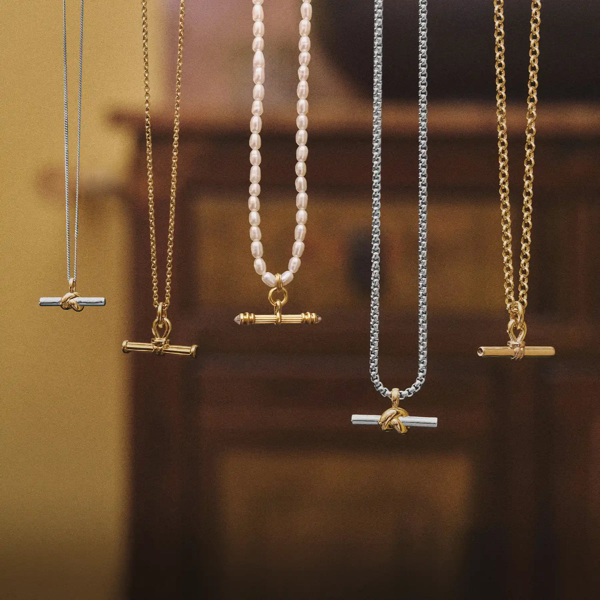 T-bar necklaces hanging