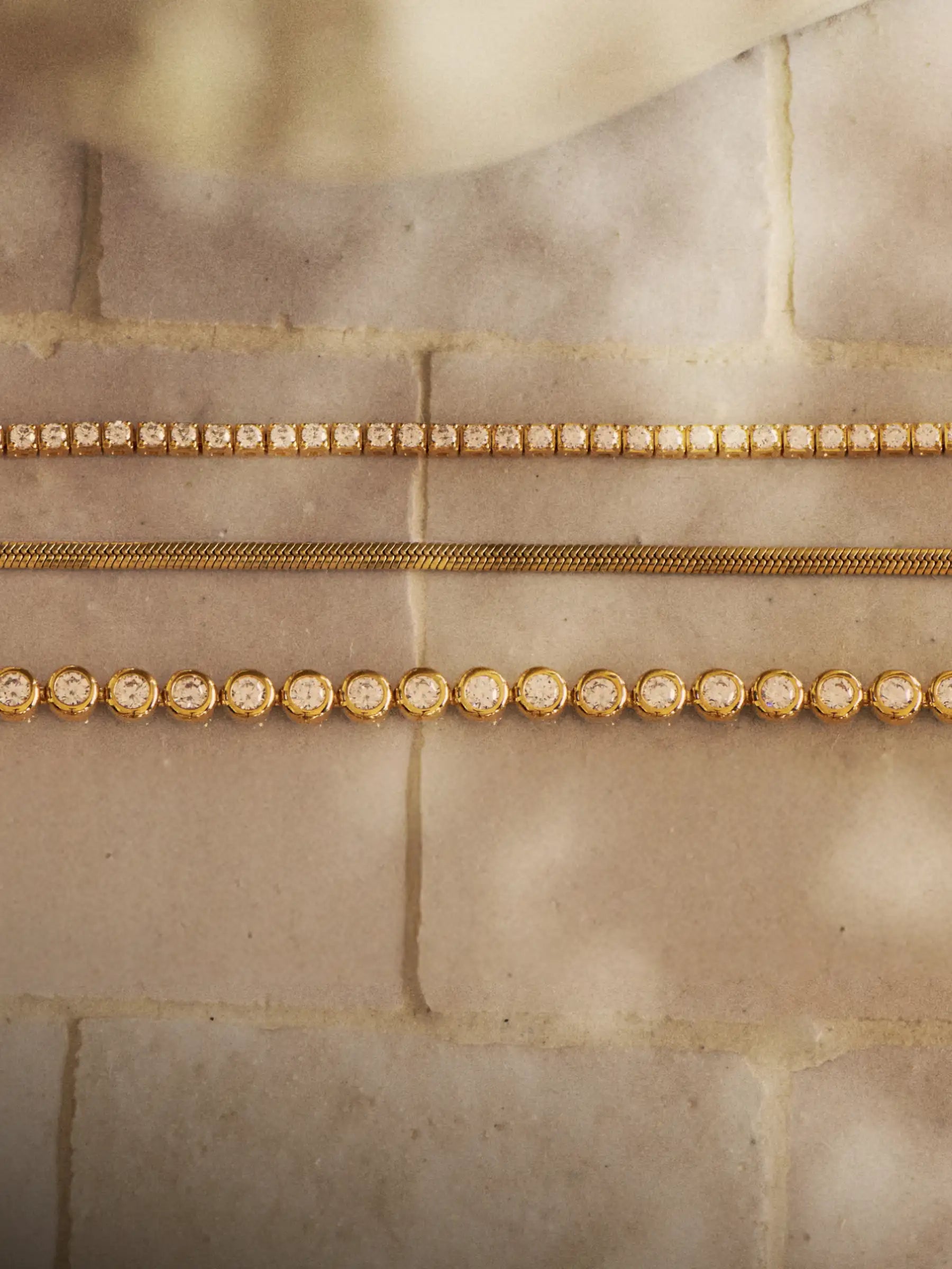 classic and round tennis bracelets in gold